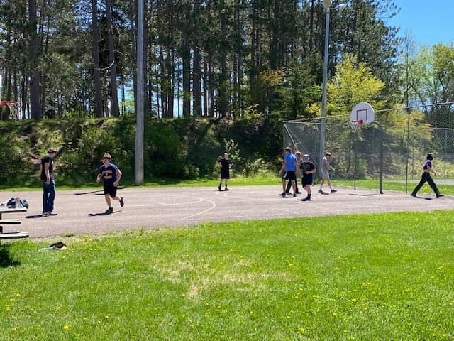 8th graders playing basketball