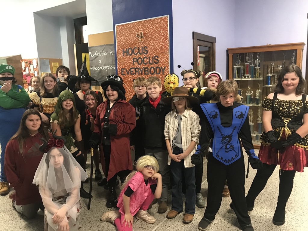 6th grade students in Halloween costumes