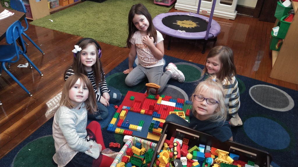 Kindergarten students building turkey traps with Legos