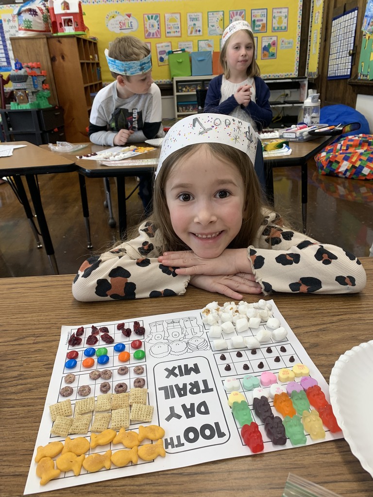 Girl with craft for 100th day of school