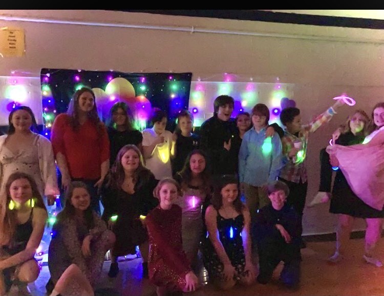 5th & 6th grade student dance with glow lights