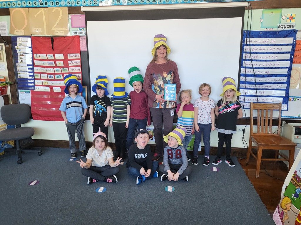 students and teacher wearing Cat in the Hat hats