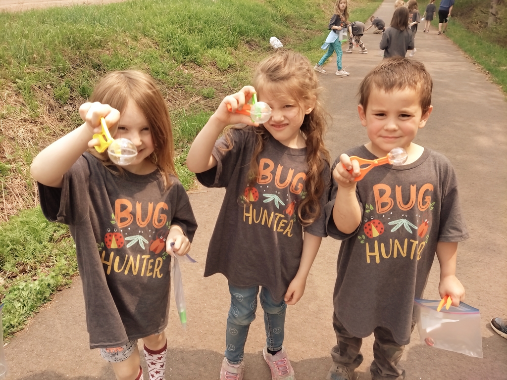 students with bug catchers