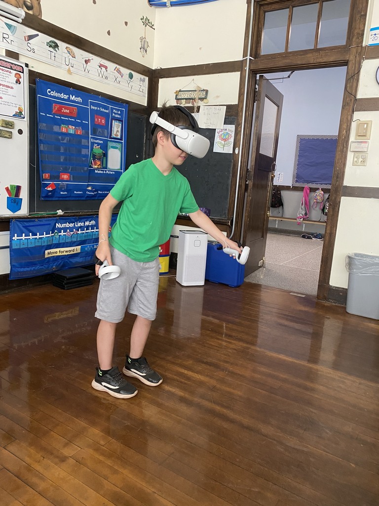 boy playing virtual reality game