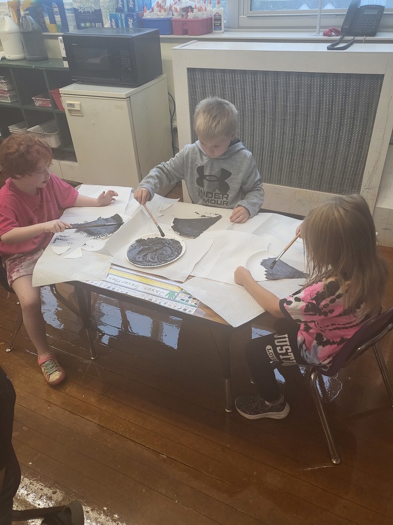 kindergarten students working on art project