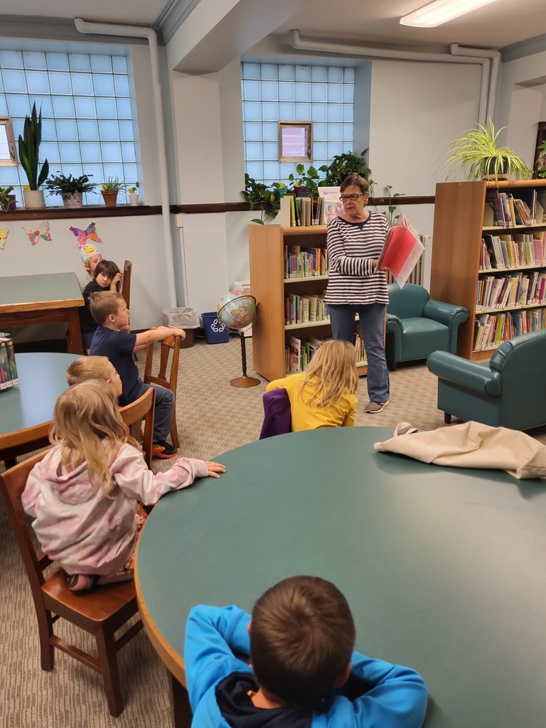 librarian reading to students